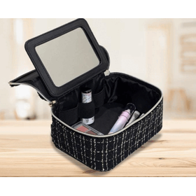 A makeup pouch with a mirror that stands up.